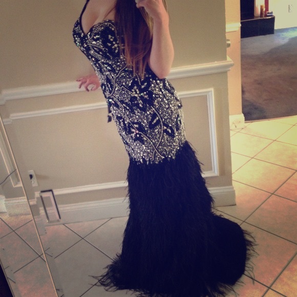 Terani Couture feathered gown. - Picture 1 of 1